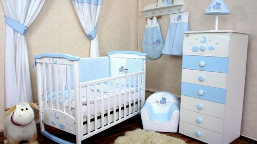 Бортики в кроватку для новорожденных (79 фото): нужны ли борты в круглую кроватку, какие размеры выбрать?